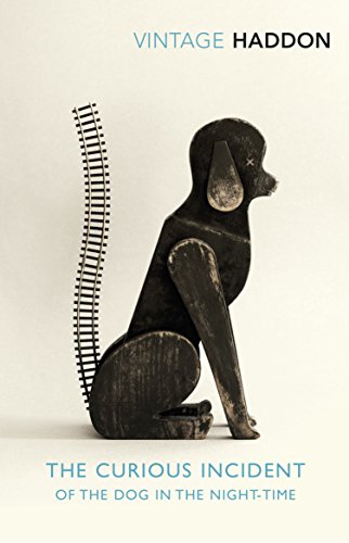 Book cover with wooden dog sculpture and title "The Curious Incident of the Dog".