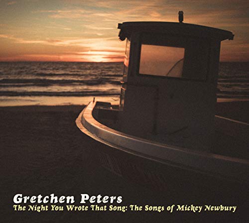 "Album cover with a lifeguard stand on a beach at sunset."