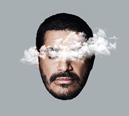 A man's head with clouds covering his eyes, against a gray background.