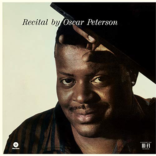 Vinyl album cover featuring Oscar Peterson, a man with a hat, looking directly.