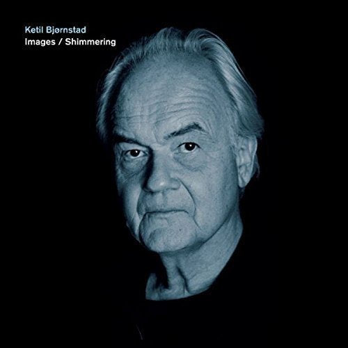 "CD cover featuring a black-and-white portrait of Ketil Bjornstad against a dark background."
