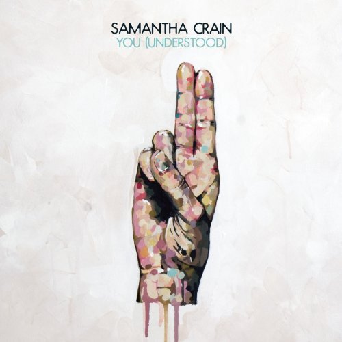 Album cover with a hand gesture and abstract design on a white background.