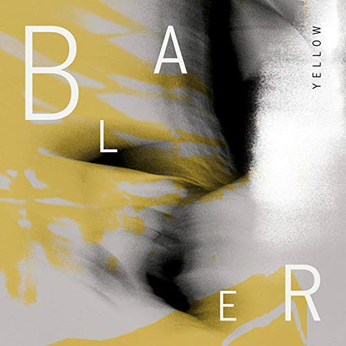 The image depicts a close-up of fabric with the word "Blaer" and "Yellow" written on it. Alt text: Close-up of yellow and gray fabric with "Blaer" and "Yellow" text overlay.