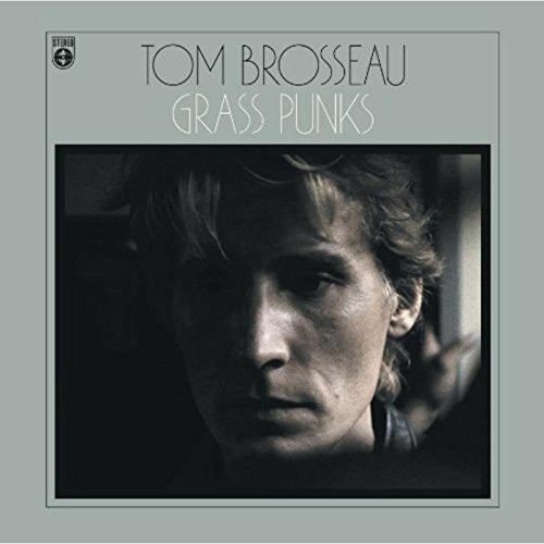 Album cover: Tom Brosseau's "Grass Punks" with a black-and-white portrait on grey background.
