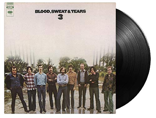 "Vinyl record cover with 'Blood, Sweat & Tears 3' and a band photo."