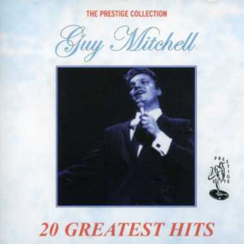 CD cover with Guy Mitchell singing into a microphone, "20 GREATEST HITS" written below.