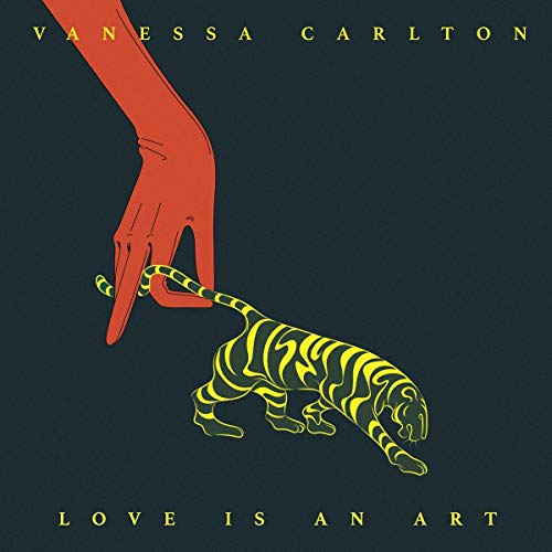 Vanessa Carlton's "Love Is An Art" album cover featuring a red hand and yellow tiger on dark background.