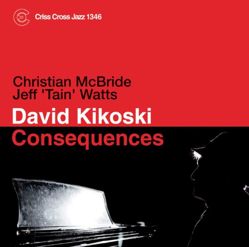 "Album cover with red and black background, piano, and silhouette of a man's profile."