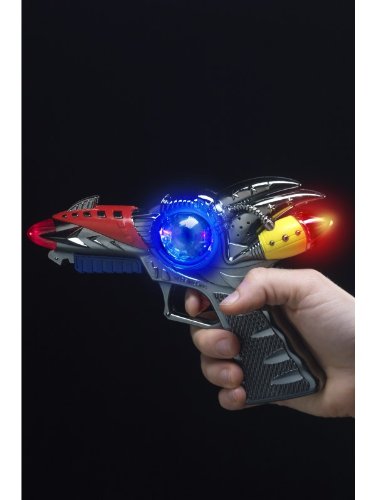 Hand holding a toy gun with glowing blue and red lights and futuristic design.