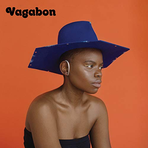 Album cover of Vagabon featuring a woman in a blue hat against an orange background.