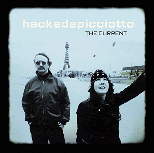 "Black and white album cover with two men standing in front of a pier."
