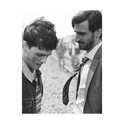 Black and white vinyl record sleeve featuring two men in suits looking down.