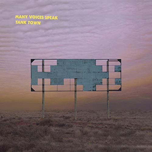 A vinyl record cover featuring a billboard in a field at sunset.