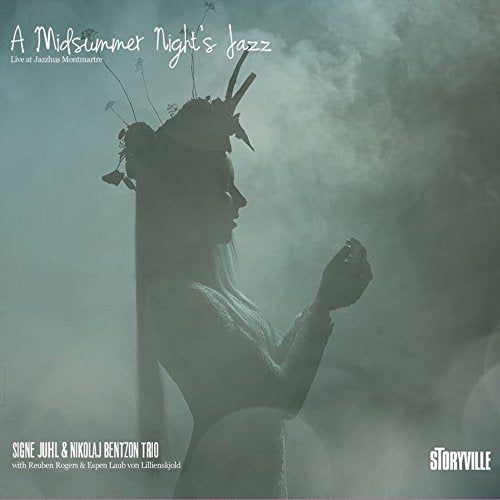 A CD cover featuring a woman's silhouette wearing a floral crown, surrounded by mist.