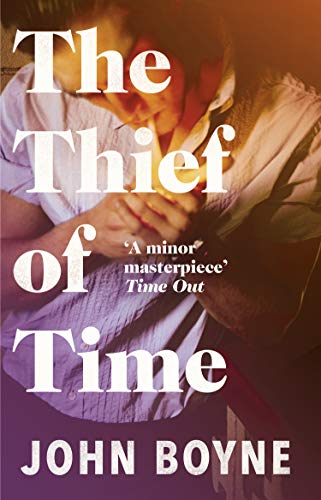 Book with dark cover, featuring clock or timepiece elements, by Terry Pratchett author.