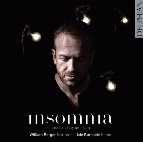 CD cover with a man surrounded by light bulbs, titled "Insomnia".