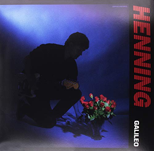 Vinyl record cover with a man crouching beside roses under blue lighting.