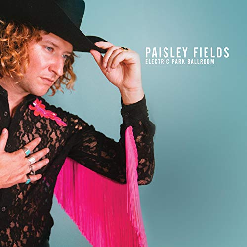 "Album cover with a man in a black hat and lace shirt."