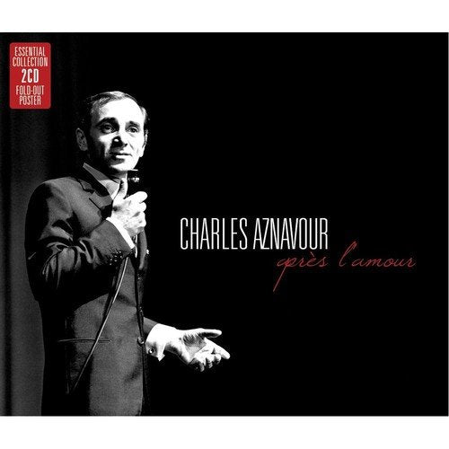 "CD cover with Charles Aznavour holding a microphone, black background, red and white text."