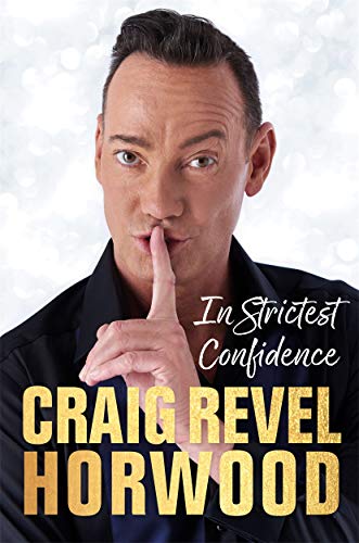 Man in black shirt with finger to lips, book cover with author's name.