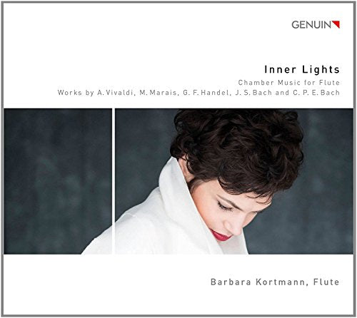 "CD cover with a woman in white, head bowed, against a dark background."