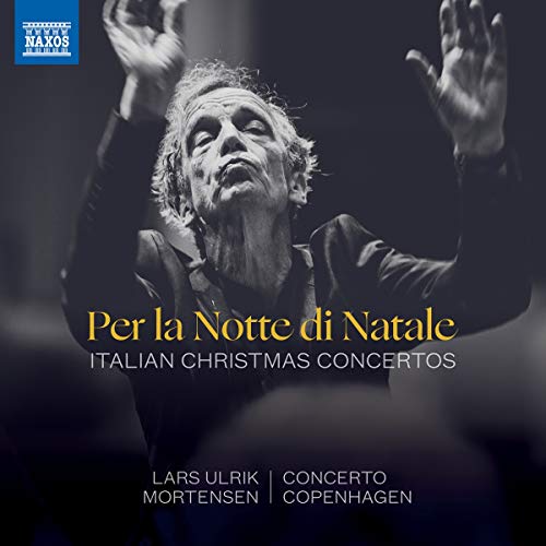 A CD cover featuring a candlelit orchestra performing in a festive, dimly lit setting.