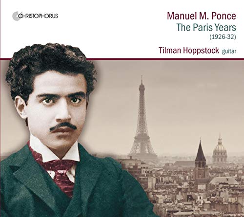 CD cover with a man in a suit and the Eiffel Tower in the background.