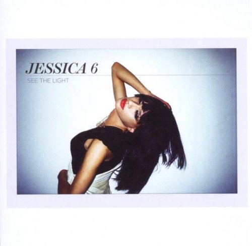"Album cover featuring a woman in a black top against a white background."
