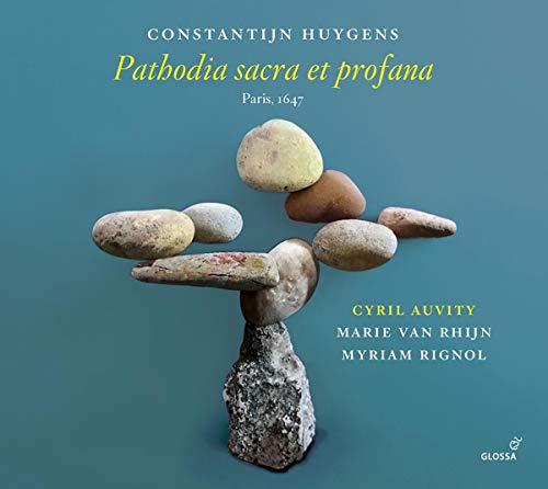 CD cover featuring a sculpture of balanced stones on a blue background.