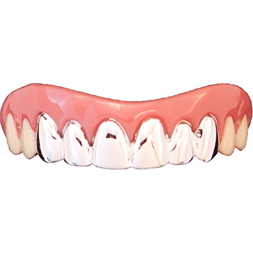 "False teeth with shiny metal front teeth and pink gums on a white background."