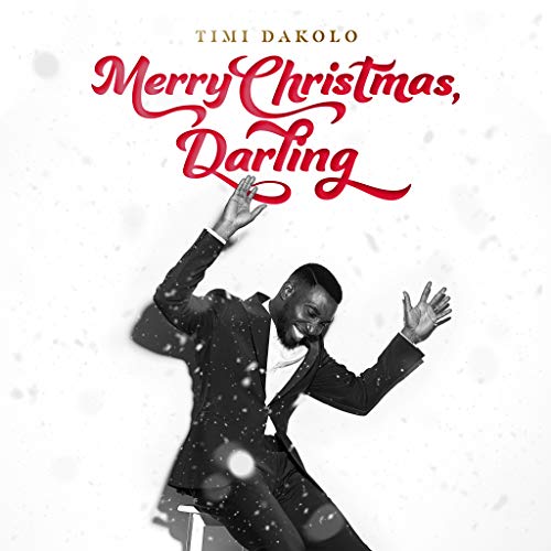 "Album cover featuring a man in a tuxedo dancing in the snow."