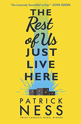 The image depicts a book cover with a yellow background and black text. Alt text: Yellow book cover with "The Rest of Us Just Live Here" in black text.