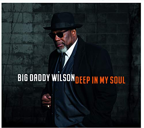 Big Daddy Wilson album cover: man in suit and hat, brick wall.