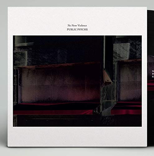 Vinyl album cover with a dark, abstract photo and white border.
