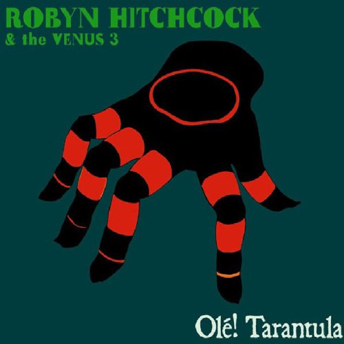 "Album cover with a black and red tarantula on a teal background."