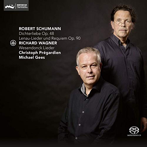 "CD cover featuring two men in dark shirts against a black background."