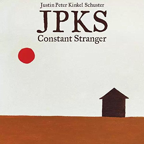 "Album cover with red circle, brown house, and text on beige and brown background."