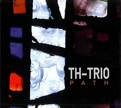 "Album cover with 'TH-TRIO PATH' text, featuring a stained glass window design."