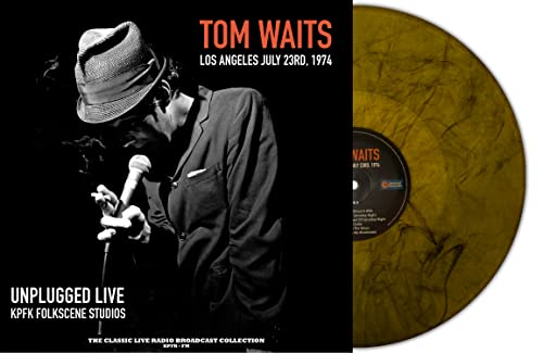 Tom Waits album cover and orange marble vinyl record shown.
