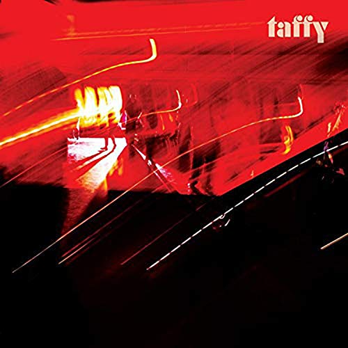 Red vinyl record cover with abstract motion blur and "taffy" in white text at the top.