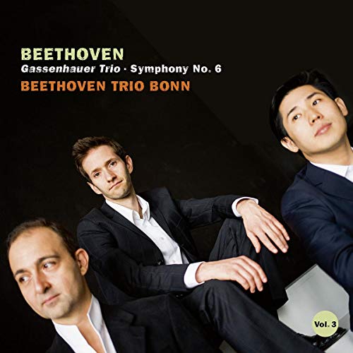 "CD cover featuring three men in suits against a black background."