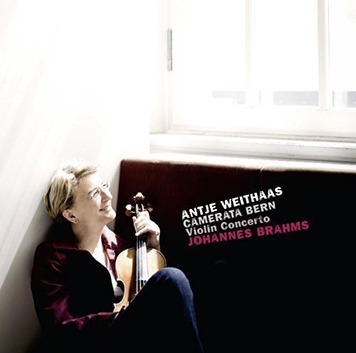 Vinyl album cover featuring a woman holding a violin, sitting by a window.
