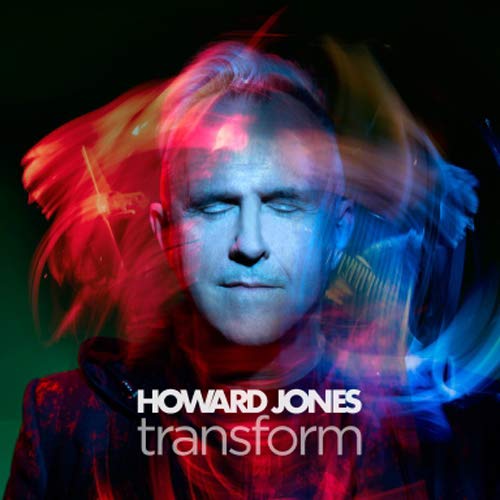 "Album cover with Howard Jones' face surrounded by red and blue motion blur."