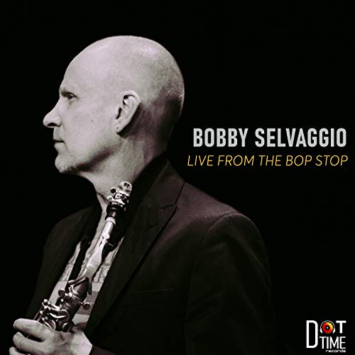 Album cover featuring a man holding a clarinet, against a black background.