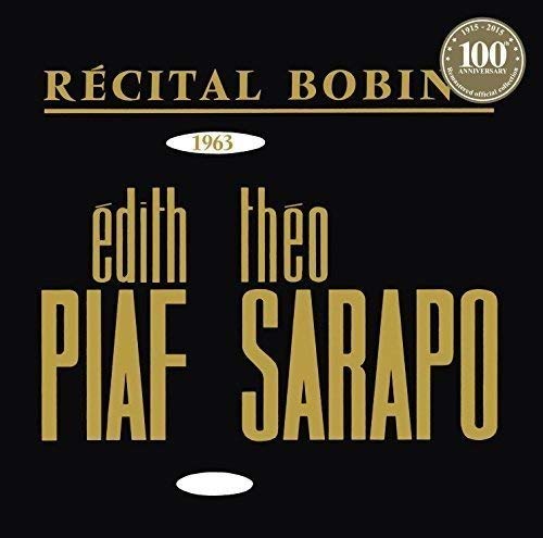 Black vinyl record cover with gold text and white accents, featuring artist names and title.