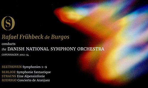 The image depicts a DVD cover with a black background and multicolored abstract design.