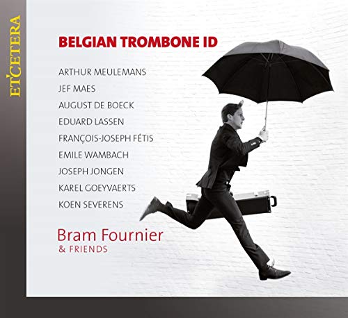 "CD cover with man in suit running with trombone case and umbrella."