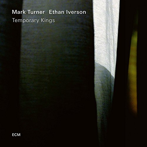 "Vinyl album cover with dark curtain and white text displaying 'Mark Turner & Ethan Iverson'."