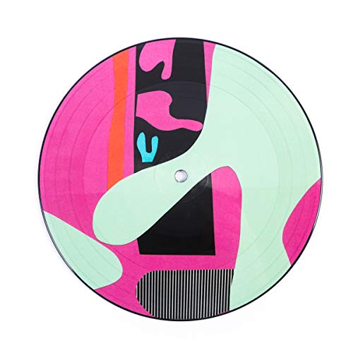 A pink, black, and mint green vinyl picture disc on a white background.