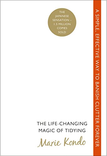 "Book cover with white background, orange stripe, and gold text, titled 'The Life-Changing Magic of Tidying'."